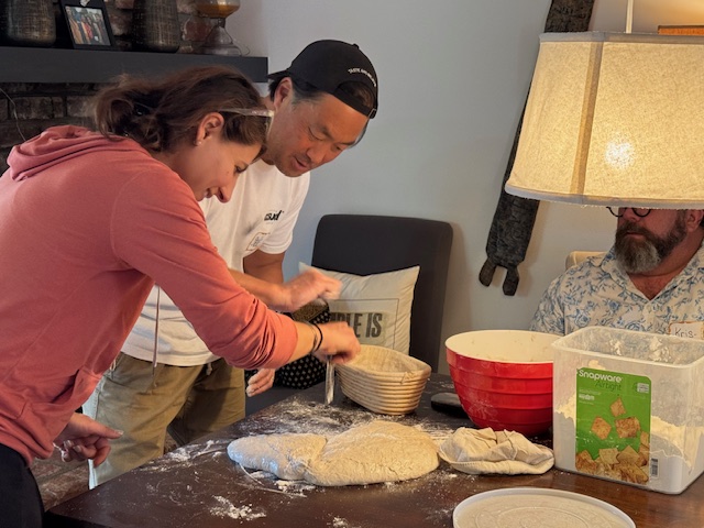Neighbors baking bread together