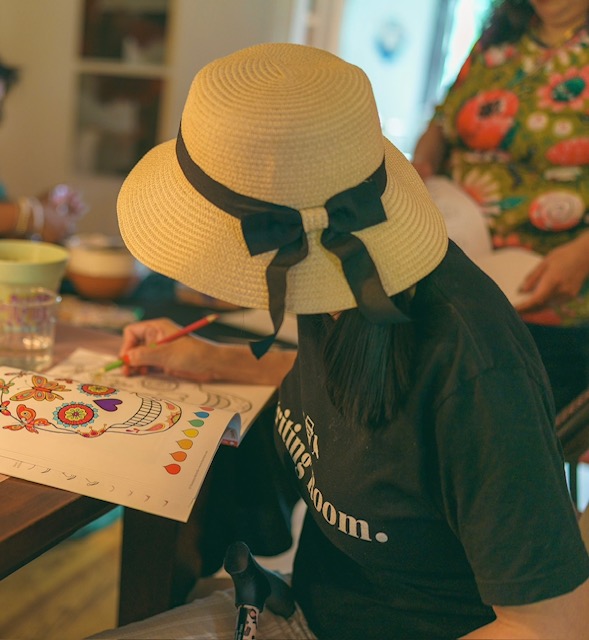Person coloring at a creative workshop